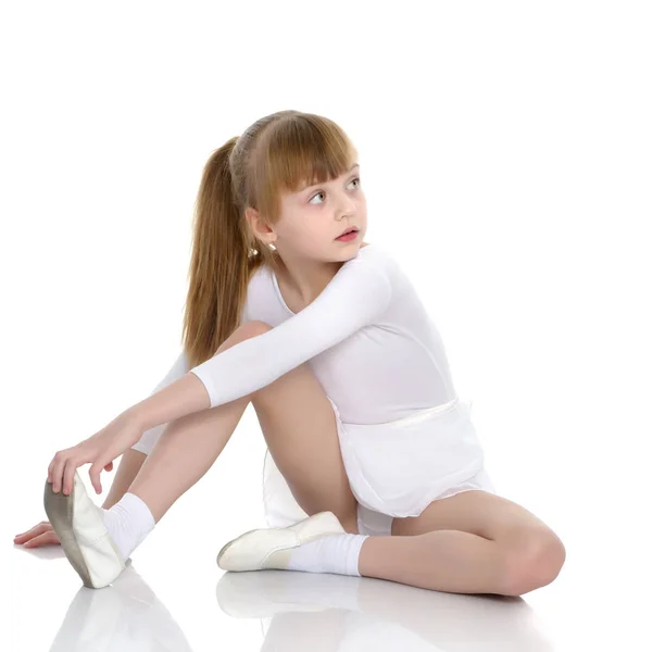 The gymnast perform an acrobatic element on the floor. — Stock Photo, Image