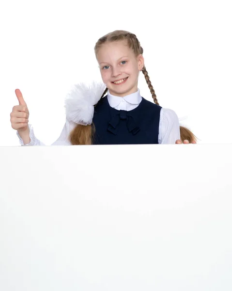 Little girl holding her thumb up — Stock Photo, Image