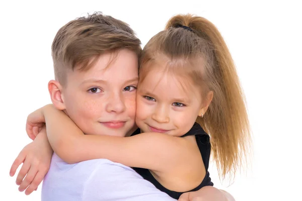 Brother and sister embrace. — Stock Photo, Image