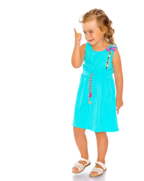 Little girl is showing a finger — Stock Photo, Image