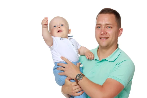 Dad is holding a baby — Stock Photo, Image