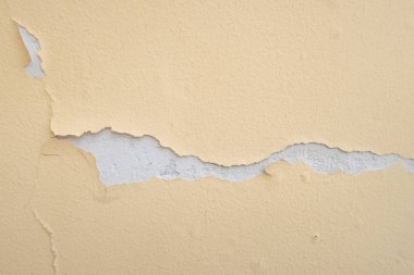 Arka plan, duvar boyası soyuluyor..