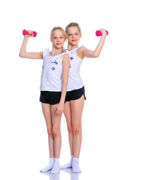 Chicas gimnastas muestran sus músculos . — Foto de Stock