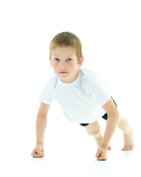 The little boy wrung out from the floor in fists — Stock Photo, Image