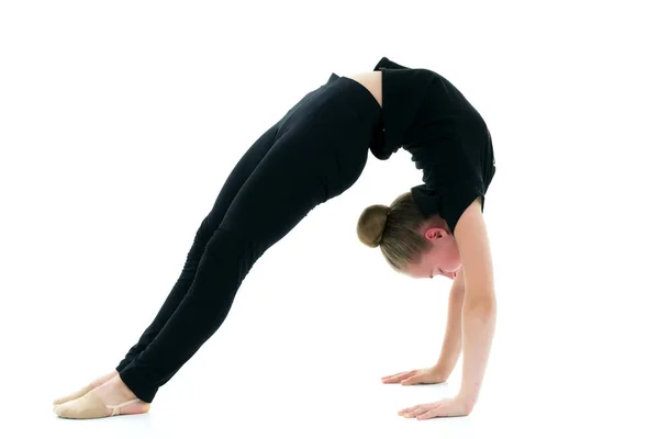 The gymnast performs a bridge.The concept of a healthy lifestyle — Stock Photo, Image