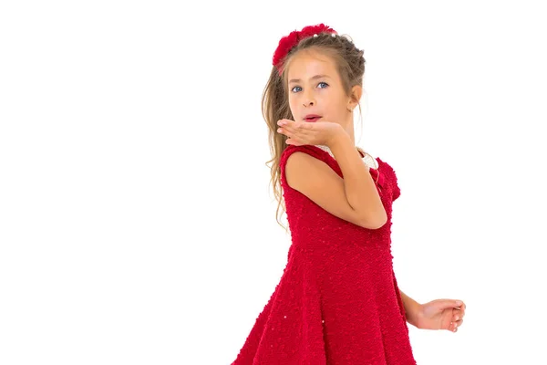 Kleines Mädchen bläst auf die Handfläche — Stockfoto