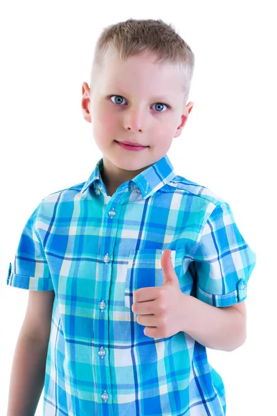 Un niño pequeño sostiene un dedo hacia arriba.El concepto de emoción y t —  Fotos de Stock