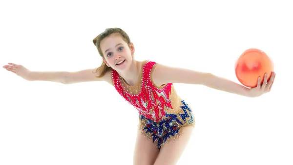 Girl gymnast performs exercises with the ball. — Stock Photo, Image