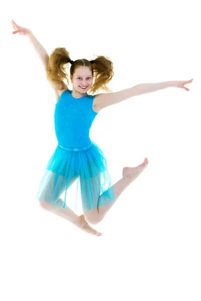 La gymnaste fille effectue un saut . — Photo