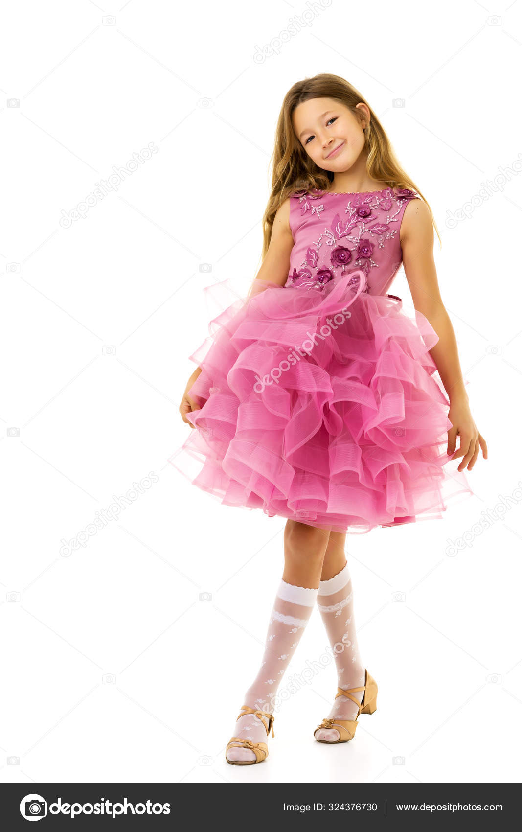 Premium Photo  Little girl in an elegant dress.the concept of a happy  childhood.