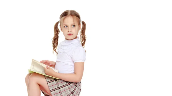 Little girl with a book — Stock Photo, Image