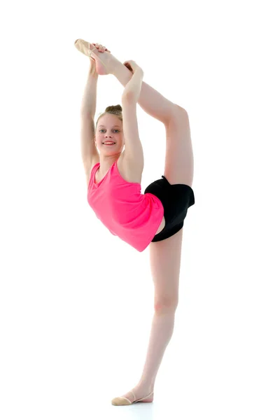 La gimnasta se equilibra en una pierna . —  Fotos de Stock