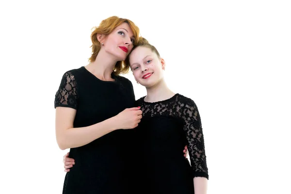 Mom and little daughter studio portrait on a white background. — Stock Photo, Image