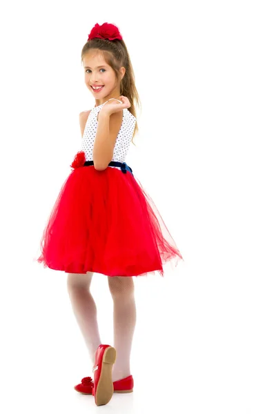 Liten flicka i en elegant klänning.Begreppet lycklig barndom — Stockfoto
