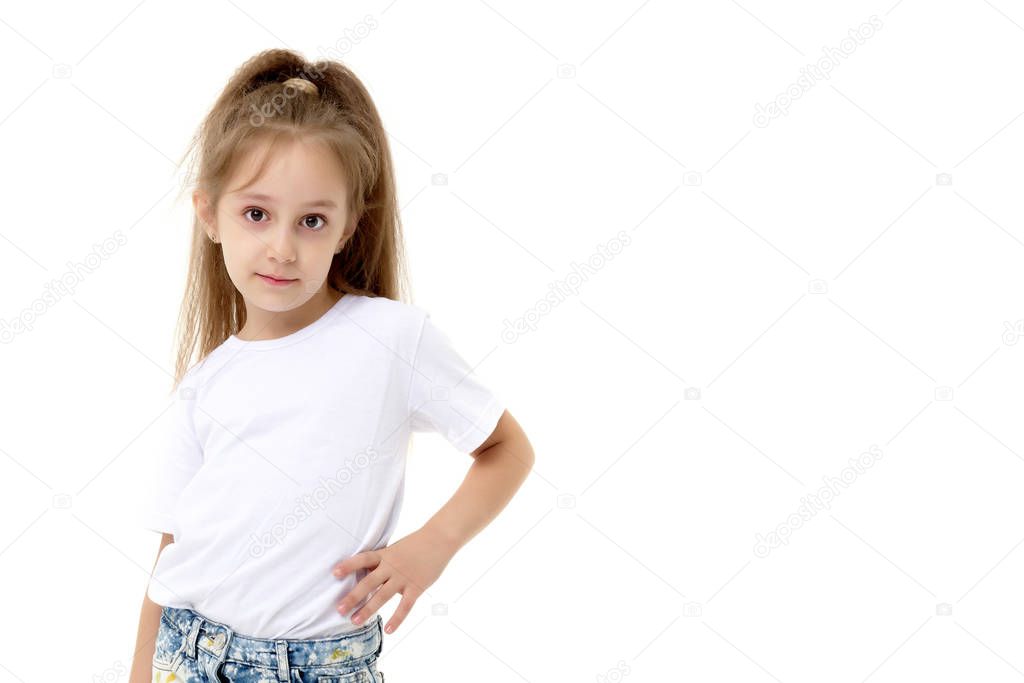Little girl in a pure white t-shirt for advertising and shorts.