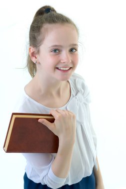 Elinde bir kitap ile sevimli küçük kız, litera kavramı