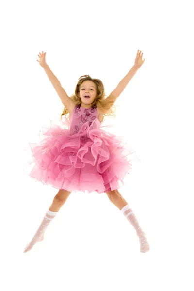 Das kleine Mädchen springt lust.das Konzept der guten Laune, summa — Stockfoto