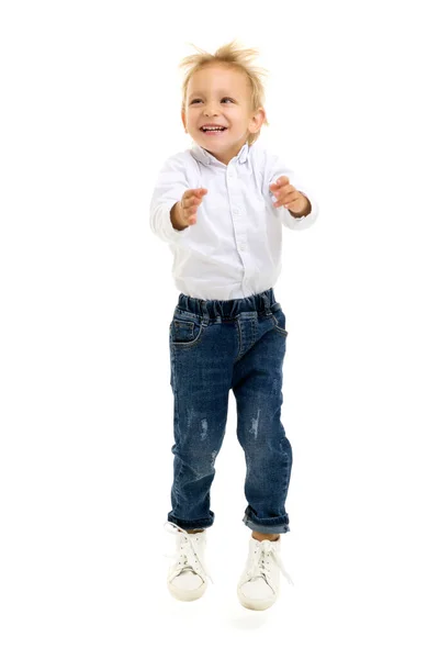 Little boy jumping.The concept of a happy childhood, sports and — Stock Photo, Image