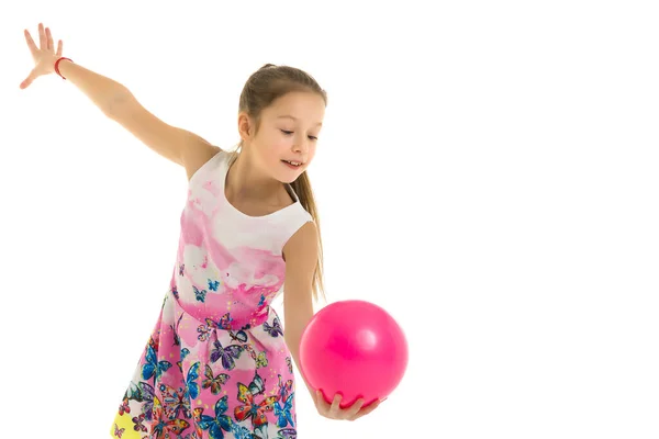 Girl gymnast performs exercises with the ball. — Stock Photo, Image