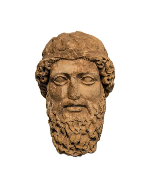 Ancient head of a bearded god, representing Zeus or Hermes — Stock Photo, Image