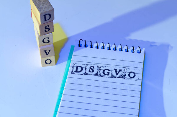 Building Blocks DSGVO (General Data Protection Regulation) in English To Do GDPR (General Data Protection Regulation) with a notepad introducing the GDPR in the EU on 25.05.2018