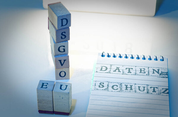 Building Blocks DSGVO (General Data Protection Regulation) in English GDPR (General Data Protection Regulation) in blue introducing the GDPR in the EU on 25.05.2018