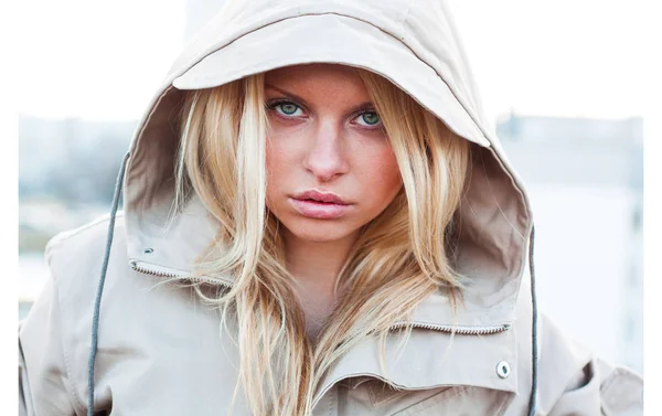Outdoor portrait of young sensual woman in the hood closeup — Stock Photo, Image