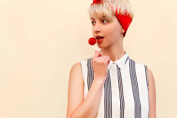 Girl with lollipop outdoors portrait — Stock Photo, Image