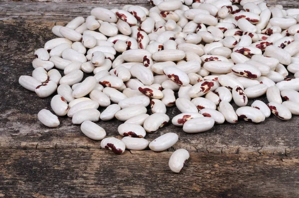 Les Haricots Blancs Sont Éparpillés Sur Fond Bois Vue Face — Photo