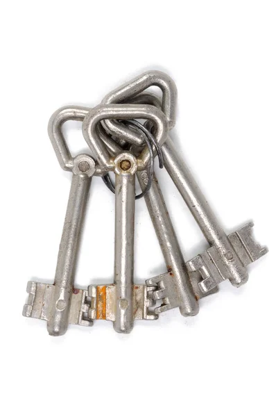 Birkaç anahtar taşı üstünde beyaz bir arka plan. Yukarıdan görüntülemek.