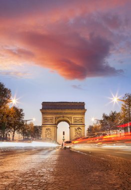 Arc de Triumph at night in Paris, France clipart