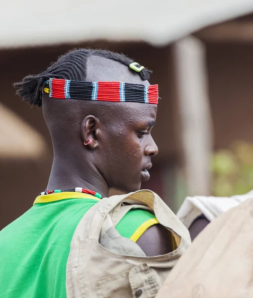 Boy from Ari tribe at village market. Bonata. Omo Valley. Ethiop — Stock Photo, Image