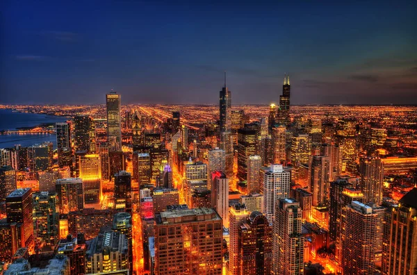 Chicago skyline om natten - Stock-foto