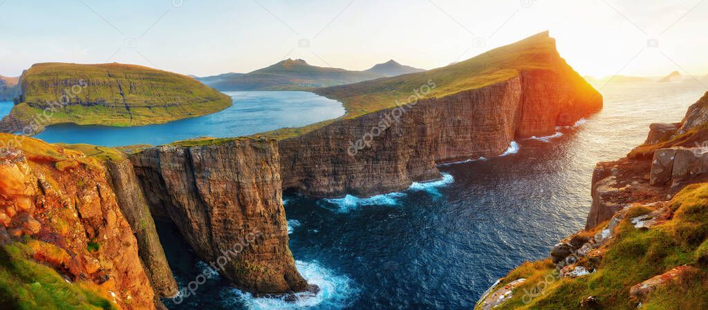 Sorvagsvatn Lake and Waterfall into the Ocean in Western Faroe Island, post processed in HDR