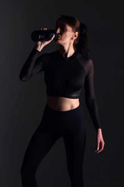 Sport concept. A strong athletic, women sprinter, wearing in the sportswear, fitness and sport motivation — 스톡 사진