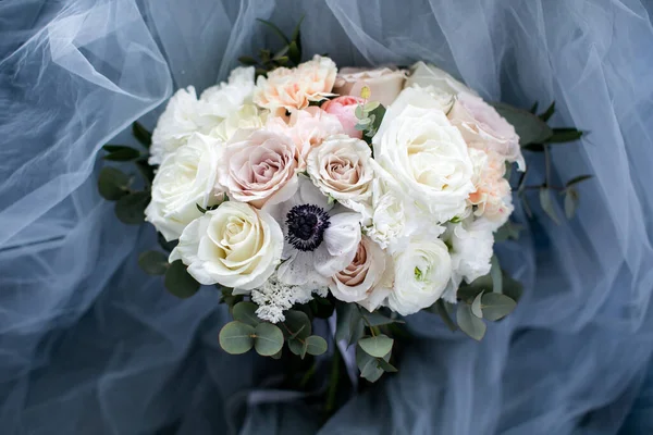 Wedding bouquet of pastel flowers, vintage style, blurred background