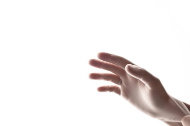 Plastik Eldiven, lastik eldiven imalatı, insan eli tıbbi eldiven takıyor. Coronavirüs