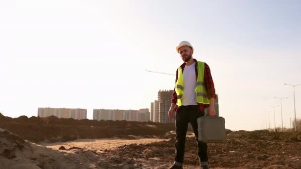 Young businessman construction site engineer,close up. — Stock Video