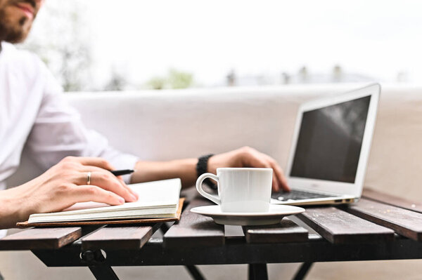 Man work at home. handsome freelancer working remotely from home.