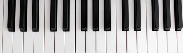 Musical keyboard isolated, top view. wide frame — Stock Photo, Image