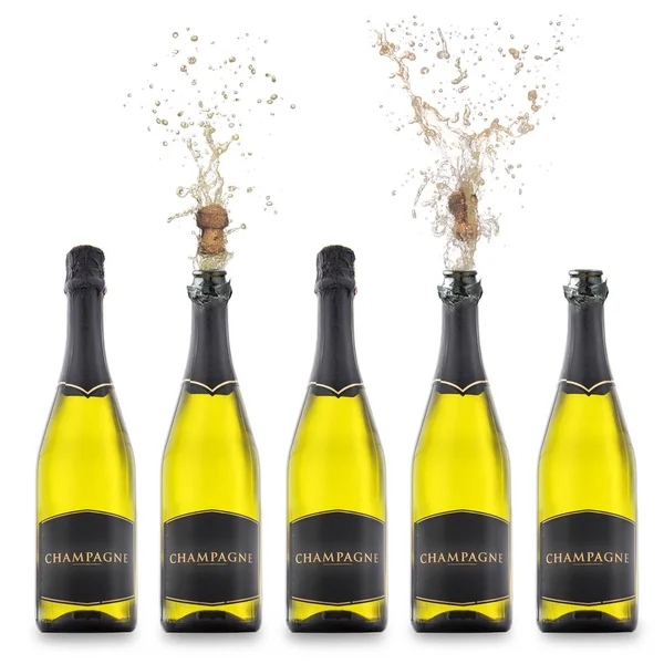Bottiglie di champagne con tappi scoppiettanti isolati Foto Stock Royalty Free