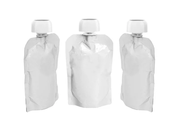 三个白色的空塑料糊状包装 从不同角度喷口和圆形盖子 用于婴儿食品 水果泥 在白色背景下隔离 — 图库照片