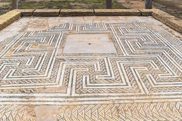 Santiponce (Sevilla), Spain, May 4, 2017. Beautiful mosaic floor with a geometric ornament in the ruins of one of the houses of the ancient Roman city of Italica.