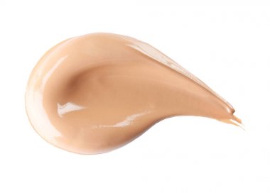 Beyaz zemin üzerine sıvı temel. Profesyonel makyaj ürünleri