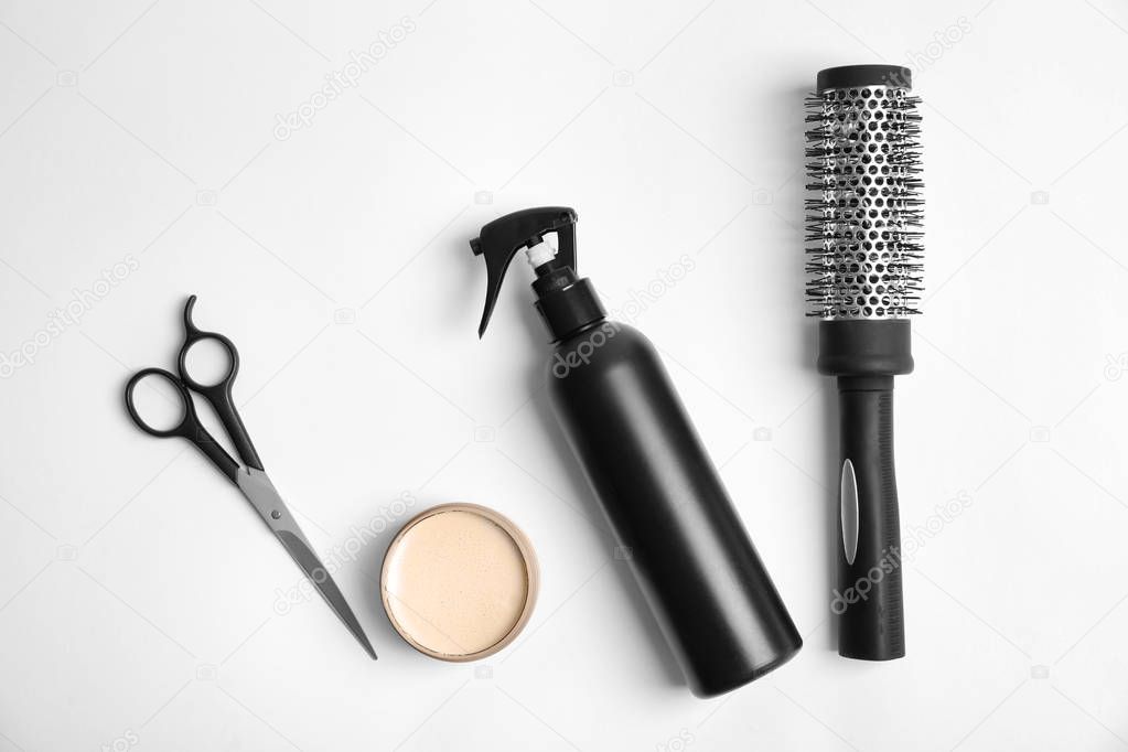 Professional hairdresser's set on white background, top view