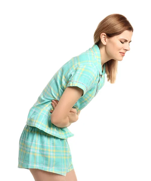 Mujer joven que sufre de dolor abdominal sobre fondo blanco —  Fotos de Stock