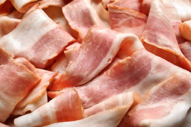 Raw bacon as background, closeup clipart