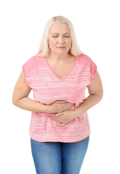 Woman suffering from abdominal pain on white background — Stock Photo, Image