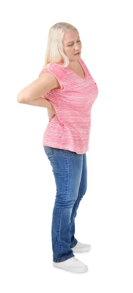 Donna che soffre di mal di schiena su sfondo bianco — Foto Stock