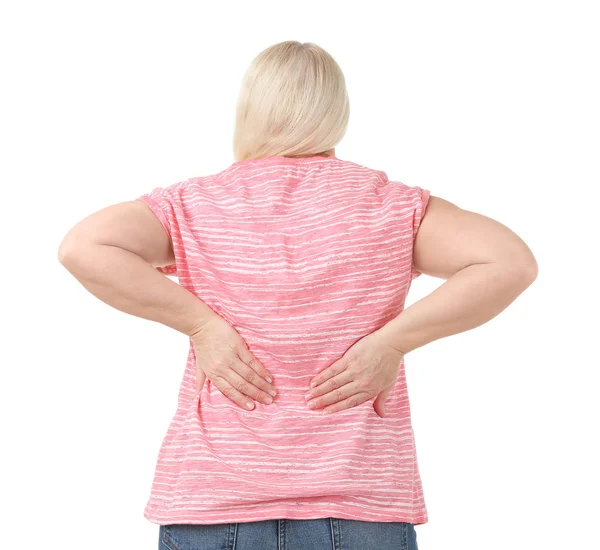 Beyaz arka plan üzerinde sırt ağrısı muzdarip kadın — Stok fotoğraf